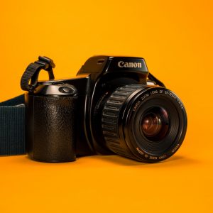 selective focus photography of Canon DSLR Camera